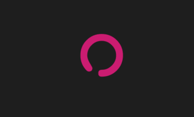a pink circle on a black background