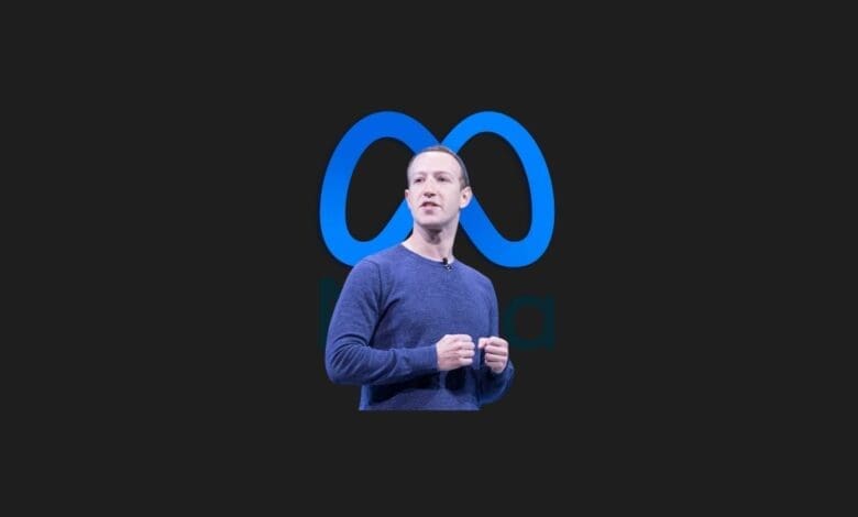 a man standing in front of a logo